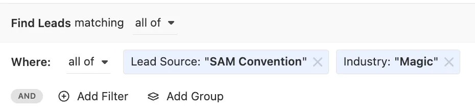 Smart View filter row showing Lead Source and Industry chips for SAM Convention and Magic.