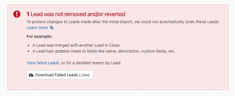 Red alert box showing a message that one lead was not removed or reverted with a button to download failed leads CSV.