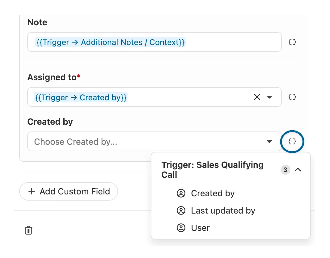 Workflow step editor showing artifact insertion menu for trigger fields and assigned user.